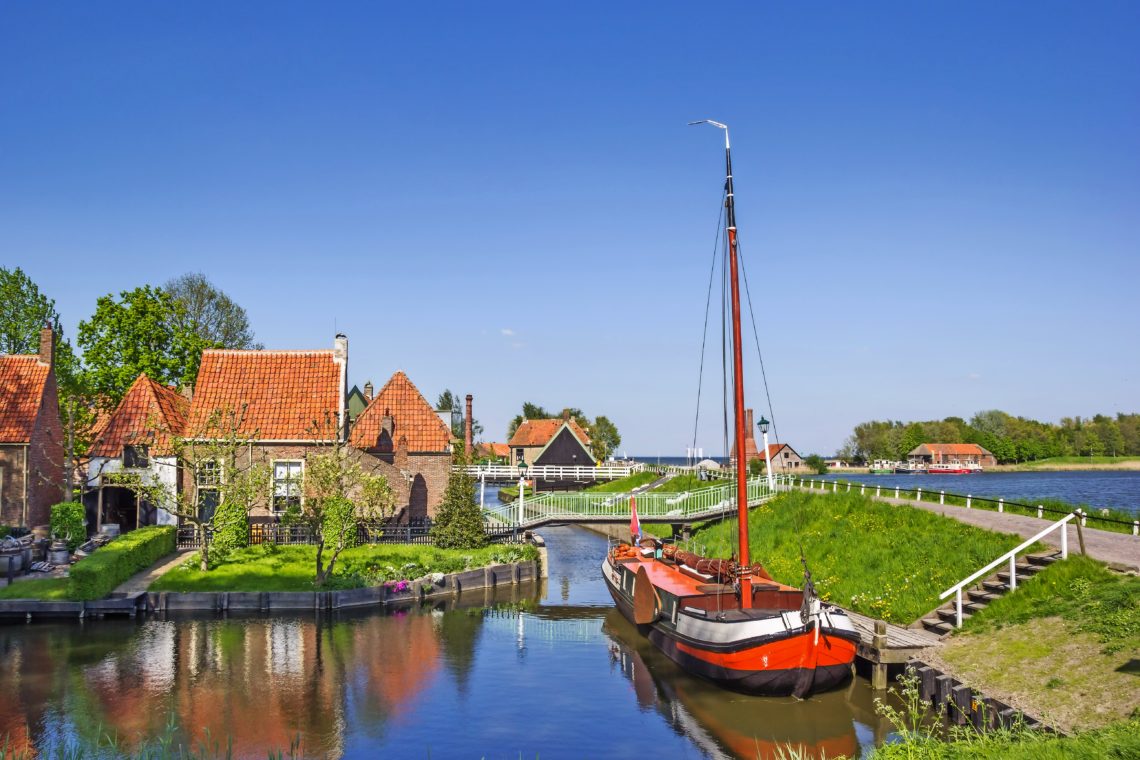 Old sailing ship in a canal in Enkhuizen, Netherlands