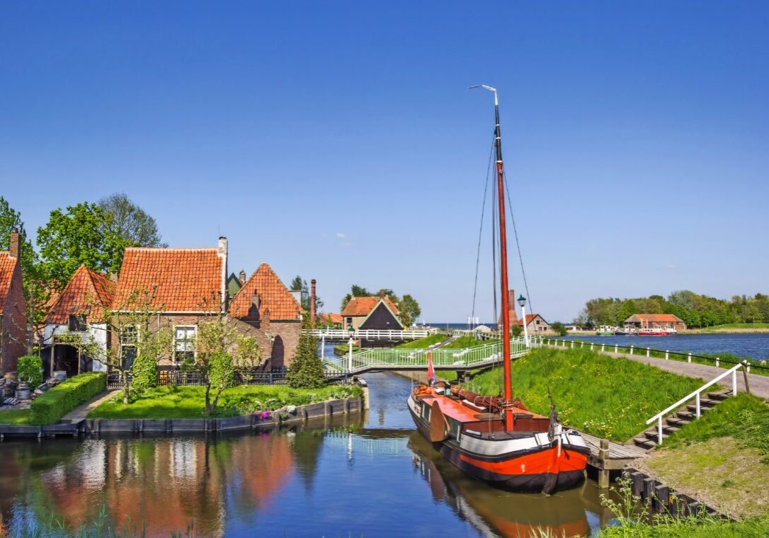 Old sailing ship in a canal in Enkhuizen, Netherlands